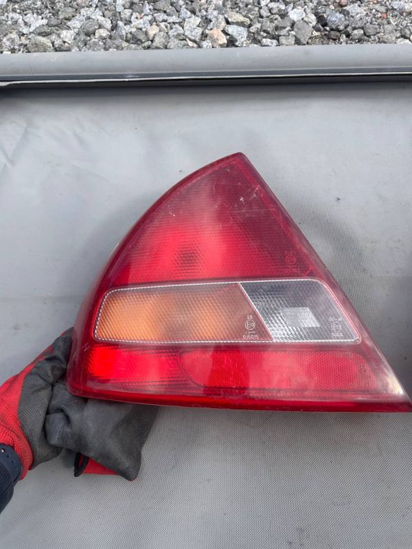 Ліхтарі задні пара стопи Mitsubishi Lancer Carisma лівий правий фонарь