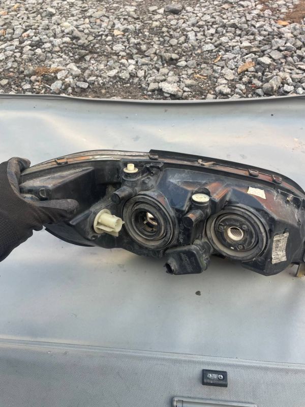 Фара передня ліва Опель зафіра Opel Zafira A Уцінка Зламані кріплення