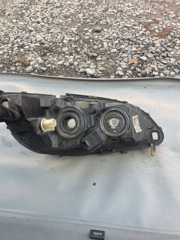 Фара передня ліва Опель зафіра Opel Zafira A Уцінка Зламані кріплення