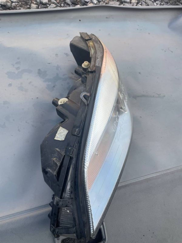 Фара передня ліва Опель зафіра Opel Zafira A Уцінка Зламані кріплення