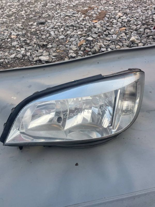 Фара передня ліва Опель зафіра Opel Zafira A Уцінка Зламані кріплення