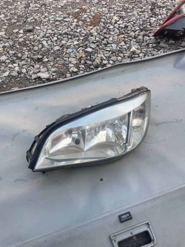 Фара передня ліва Опель зафіра Opel Zafira A Уцінка Зламані кріплення