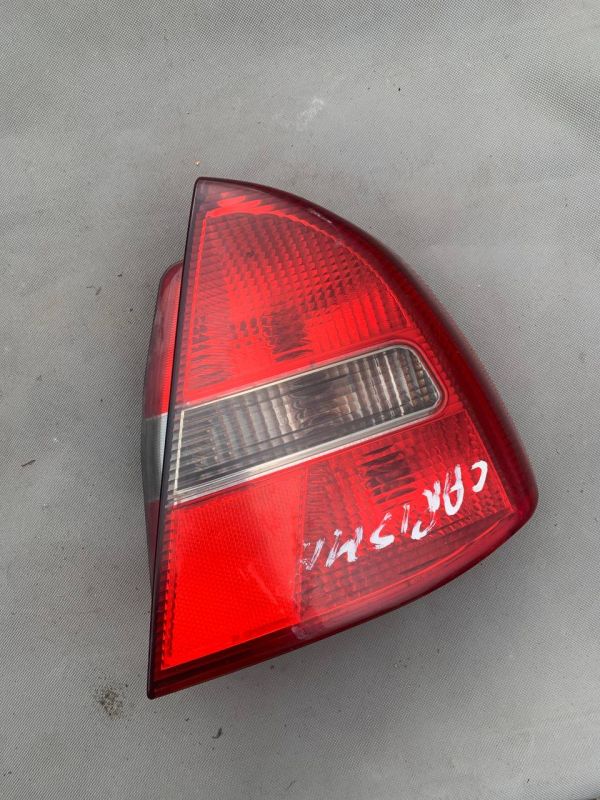 Задні ліхтарі стопи лівий правий фонарь Mitsubishi Carisma Митсубиси 