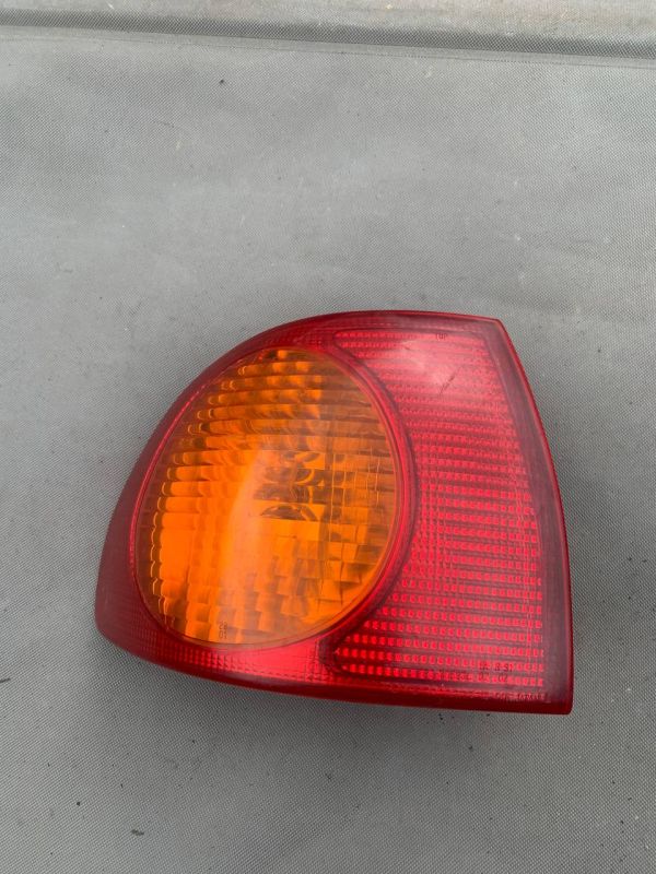 Ліхтар стоп фонарь задній лівий Toyota Corolla Седан
